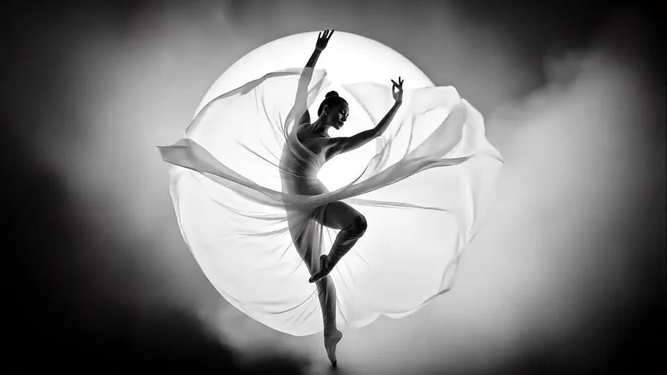 A dancer joined by a partner