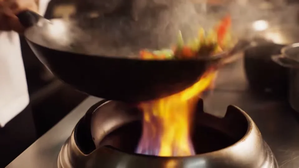Vegetables tossed in a wok